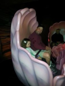 Ride in a clam shell during the Under the Sea ride