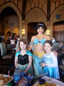 Meeting Jasmine at Cinderella's Royal Table. Cinderella greets you as you enter the castle then you go upstairs to eat and get visited by multiple princesses at your table.