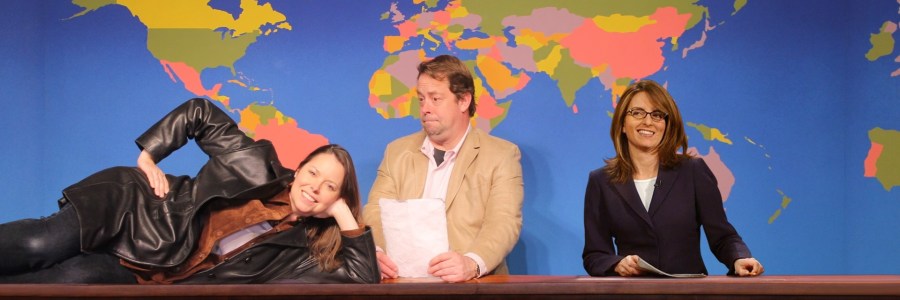 SNL's Weekend Update set with a superimposed Tina Fey